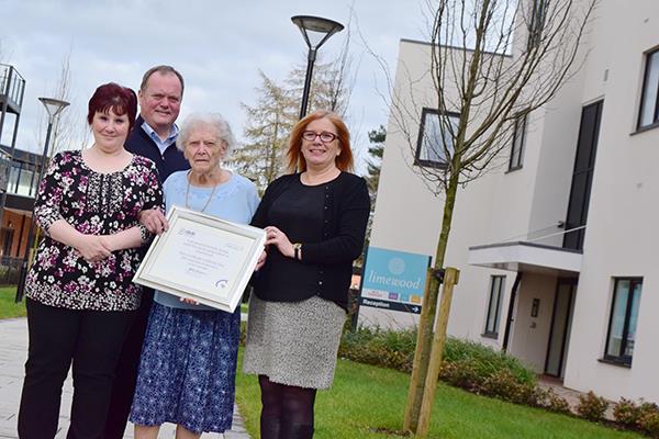 Limewood staff with gold certificate for dementia award